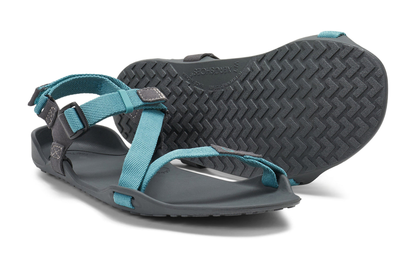Xero Barefoot Shoes sold in Ontario, Canada. These minimalist shoes have flexible soles, wide toe boxes, and zero drop. Pair view of Xero Women's Z-Trek in Porcelain, a lightweight packable sport sandal.
