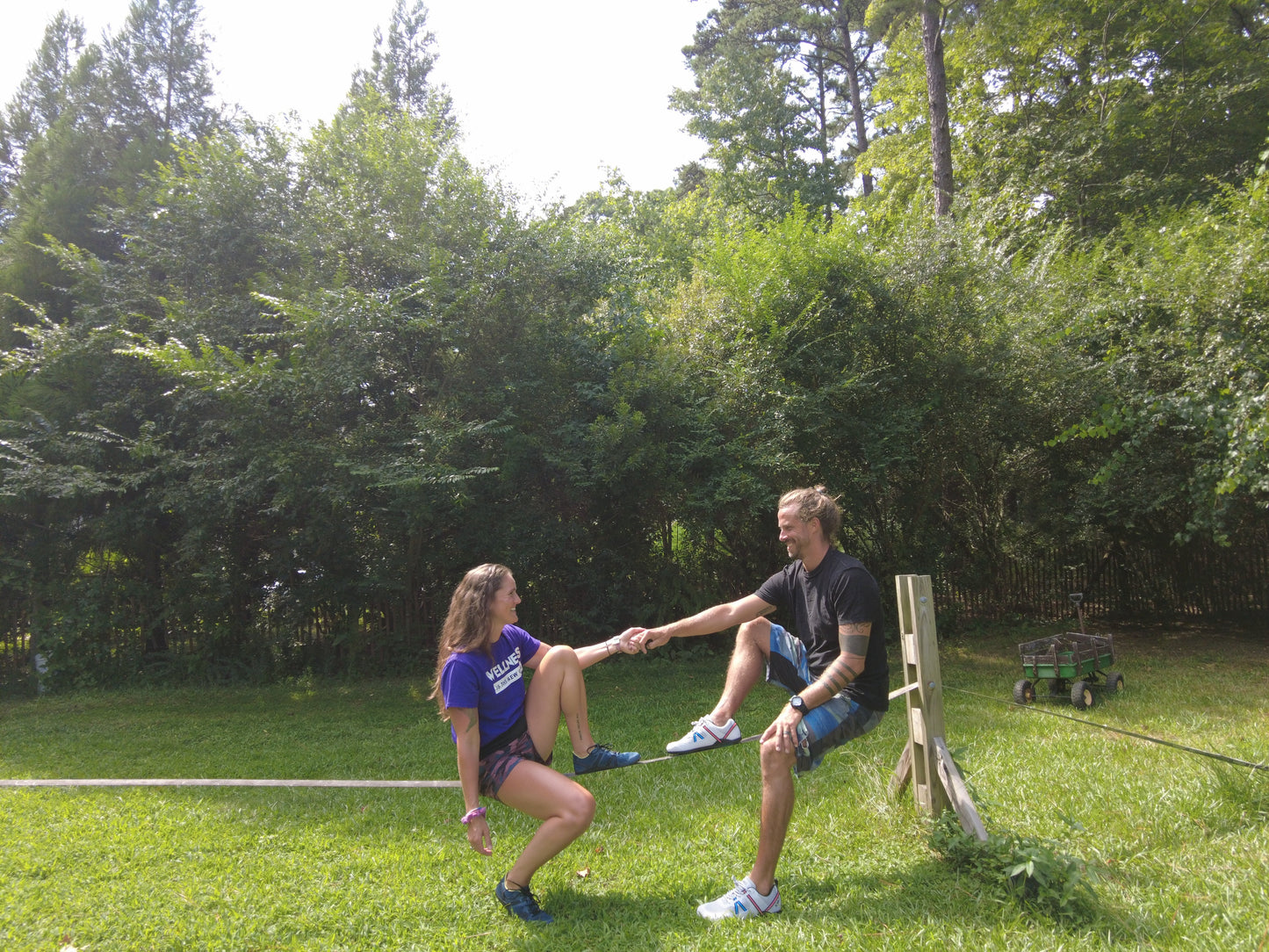 Xero Barefoot Shoes sold in Ontario, Canada. Adventurous couple wearing Speed Force II while on tightrope.