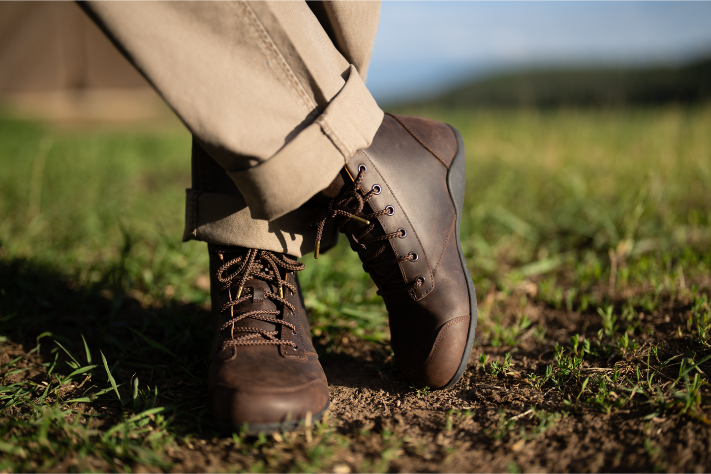Xero shoes Canada, man wearing Denver Leather in a field