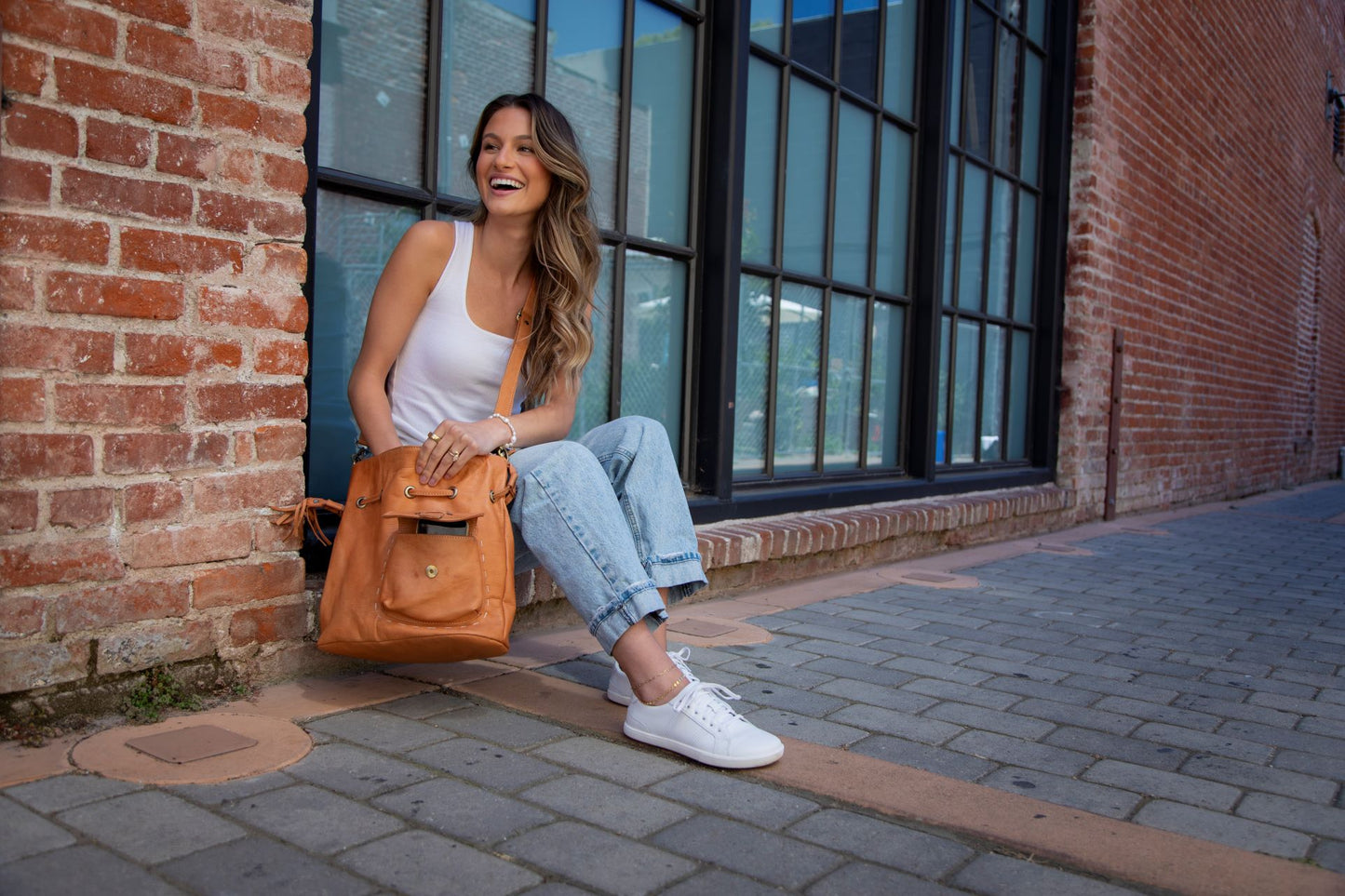 Xero Shoes Canada, a woman wearing Dillon Leather with jeans in the city