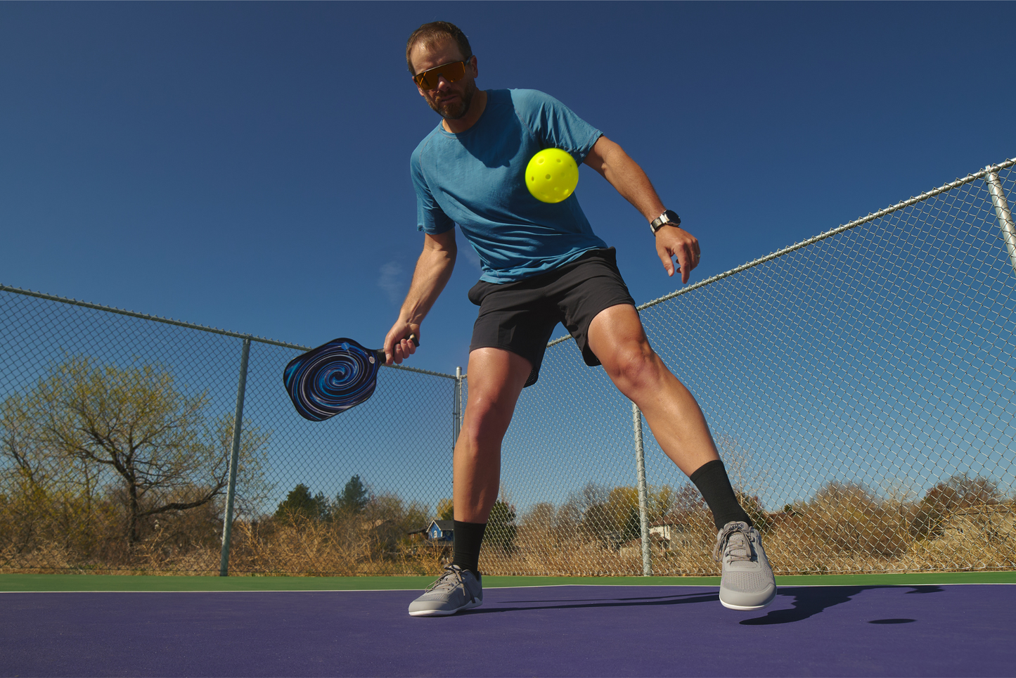 Xero Shoes Canada, specifically barefoot running shoes Canada. Man wearing Prio Neo on the court