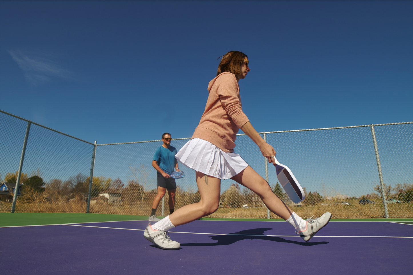 Xero Shoes Canada, specifically women’s barefoot shoes Canada. Woman wearing Prio while playing pickleball.