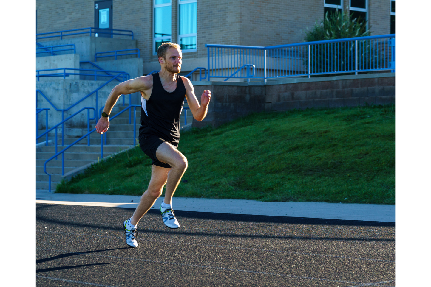 Xero Shoes Canada, specifically barefoot running shoes Canada. Man wearing Speed Force II while sprinting