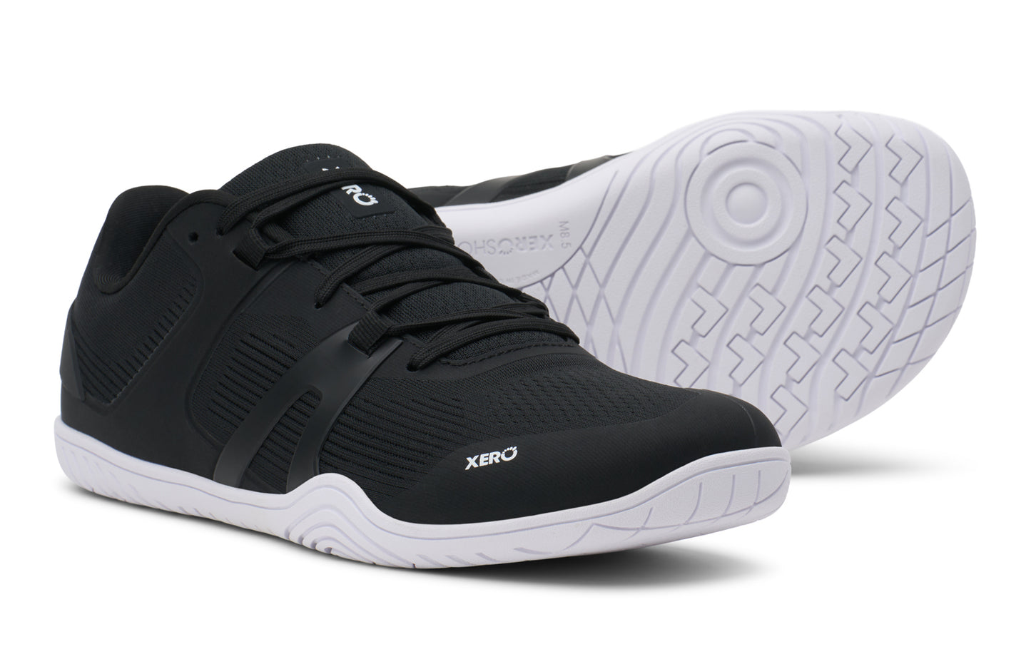 Black athletic shoe with white sole on a white background. Tru Stride Co brings Xero Shoes to Canada
