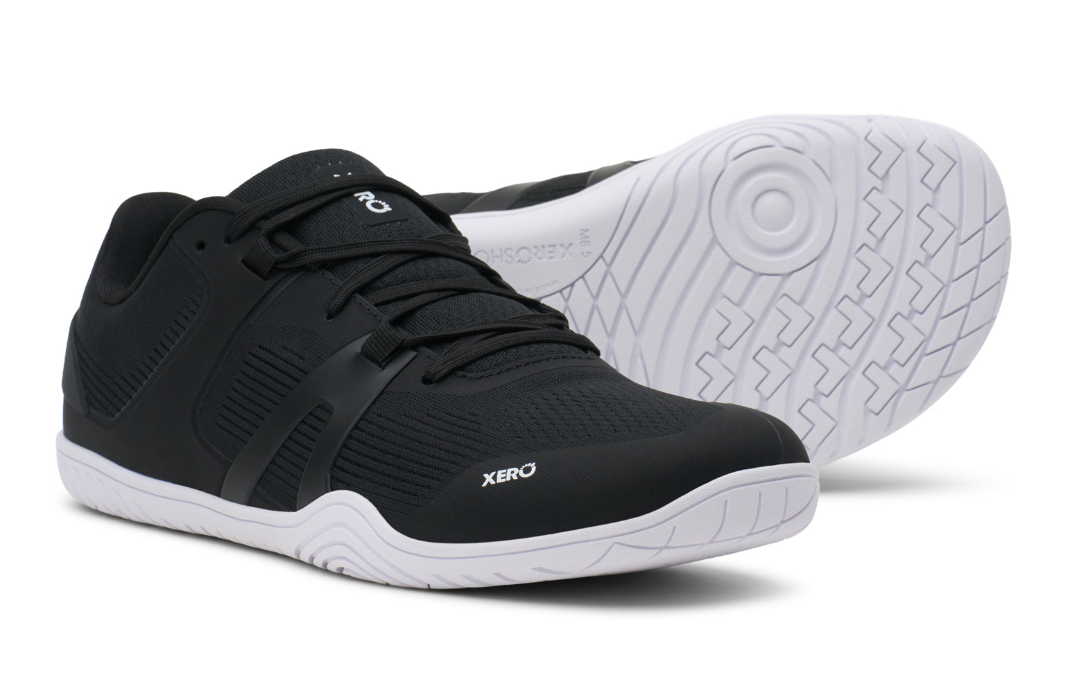 Black athletic shoe with white sole on a white background. Tru Stride Co brings Xero Shoes to Canada