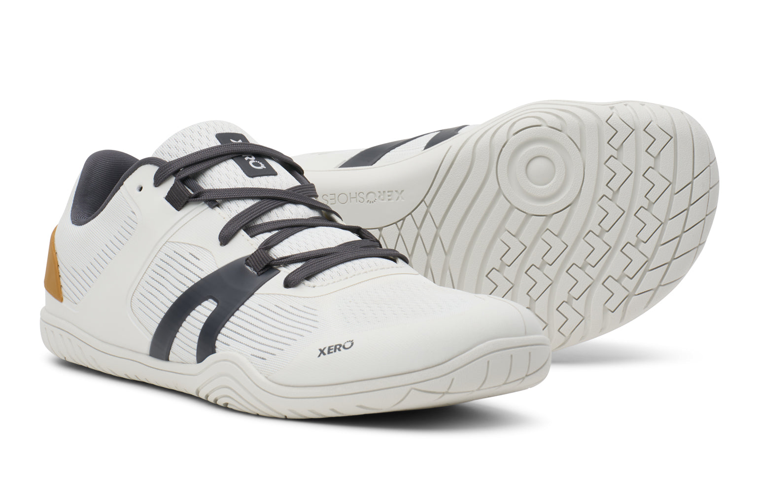 White athletic shoes with black laces and 'Xero' branding on a white background. Tru Stride Co brings Xero Shoes to Canada
