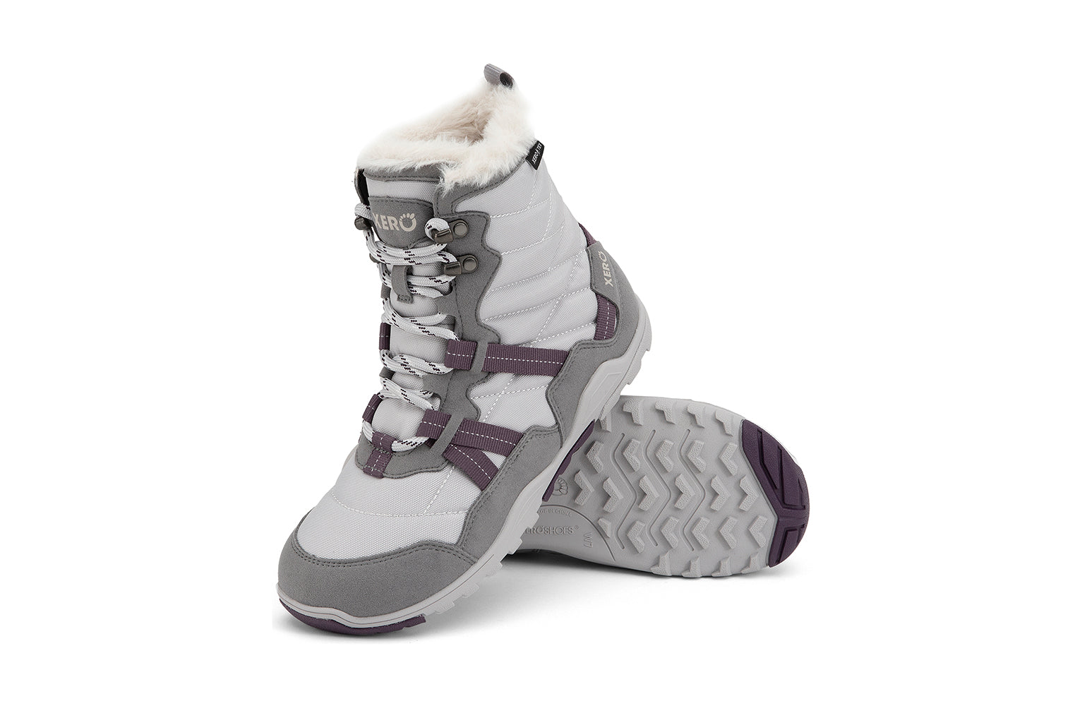Xero Barefoot Shoes sold in Ontario, Canada. These minimalist shoes have flexible soles, wide toe boxes, and zero drop. Angled pair view of Xero Women's Alpine in Frost Gray/White. Waterproof, lightweight snow boot. 
