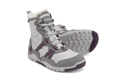 Xero Barefoot Shoes sold in Ontario, Canada. These minimalist shoes have flexible soles, wide toe boxes, and zero drop. Side and sole pair view of Xero Women's Alpine in Frost Gray/White. Waterproof, lightweight snow boot. 