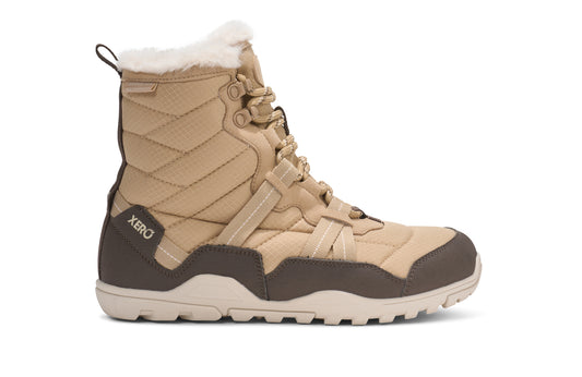 Tan and brown winter boot with Xero branding on a white background. Tru Stride Co brings Xero Shoes to Canada