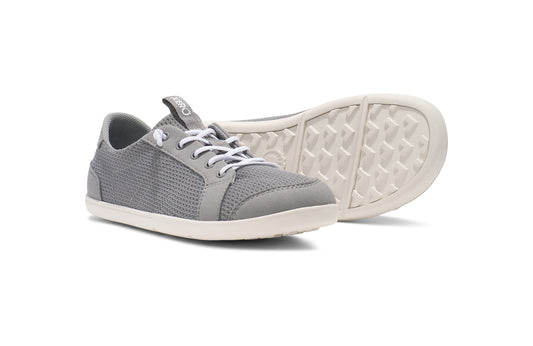 Xero Shoes Canada, barefoot shoes for kids. Xero Kids Barefoot Shoes sold in Ontario, Canada. These minimalist shoes have flexible soles, wide toe boxes, and zero drop. Pair view of Xero Big Kid's Dillon in Alloy, a classic sneaker.