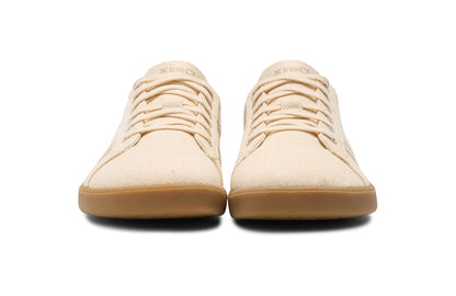 Xero Shoes Canada, specifically men’s barefoot shoes Canada. These minimalist shoes have flexible soles, wide toe boxes, and zero drop. Front view of Xero Men's Dillon Canvas in Natural Gum, a classic sneaker.