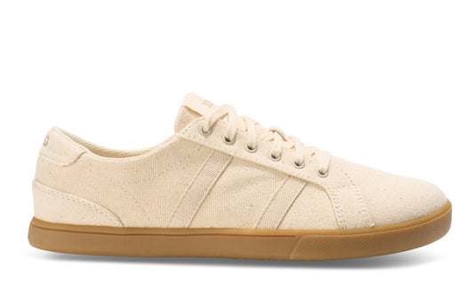 Xero Shoes Canada, specifically women’s barefoot shoes Canada. These minimalist shoes have flexible soles, wide toe boxes, and zero drop. Side view of Xero Women's Dillon Canvas in Natural Gum, a classic sneaker.