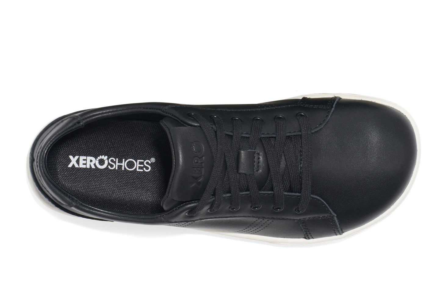 Xero Shoes Canada, specifically women’s barefoot shoes Canada. These minimalist shoes have flexible soles, wide toe boxes, and zero drop. Top view of Women's Dillon Leather in Black. A classic leather sneaker. 