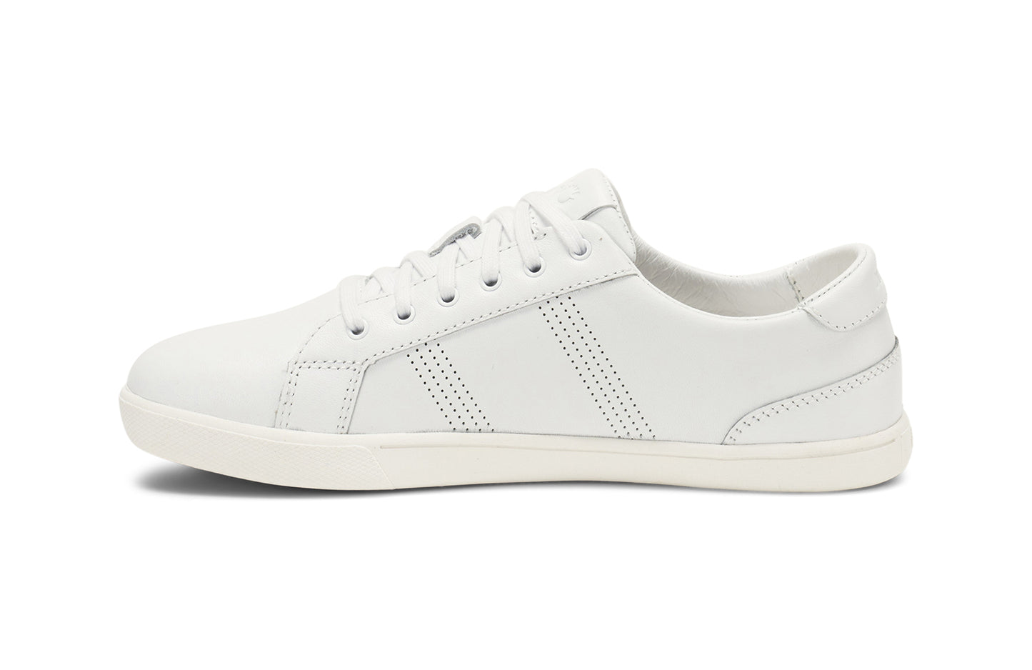 Xero Shoes Canada, specifically women’s barefoot shoes Canada. These minimalist shoes have flexible soles, wide toe boxes, and zero drop. Side view of Women's Dillon Leather in White. A classic leather sneaker. 