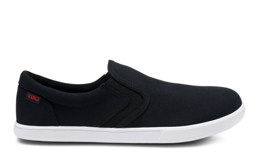 Black slip-on sneaker with white sole on a white background