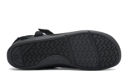 Black flat with a textured sole on a white background.  Tru Stride Co brings Xero Shoes to Canada