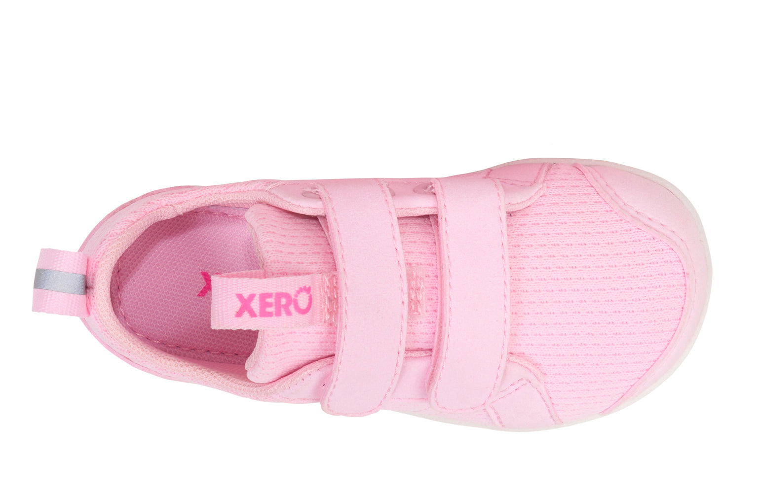 Xero Barefoot shoes for kids sold in Ontario, Canada. These minimalist shoes have flexible soles, wide toe boxes, and zero drop. Top view of Xero Dillon Little Kids in Pink-a-Boo, a classic sneaker.