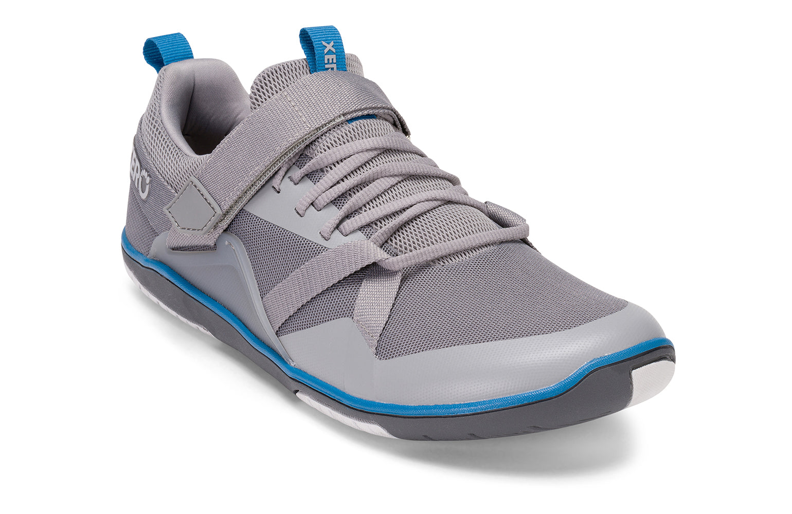 Xero Shoes Canada, specifically barefoot running shoes Canada. These minimalist shoes have flexible soles, wide toe boxes, and zero drop. Angled view of Xero Men's Forza Trainer in Frost Gray. A stable training shoe.
