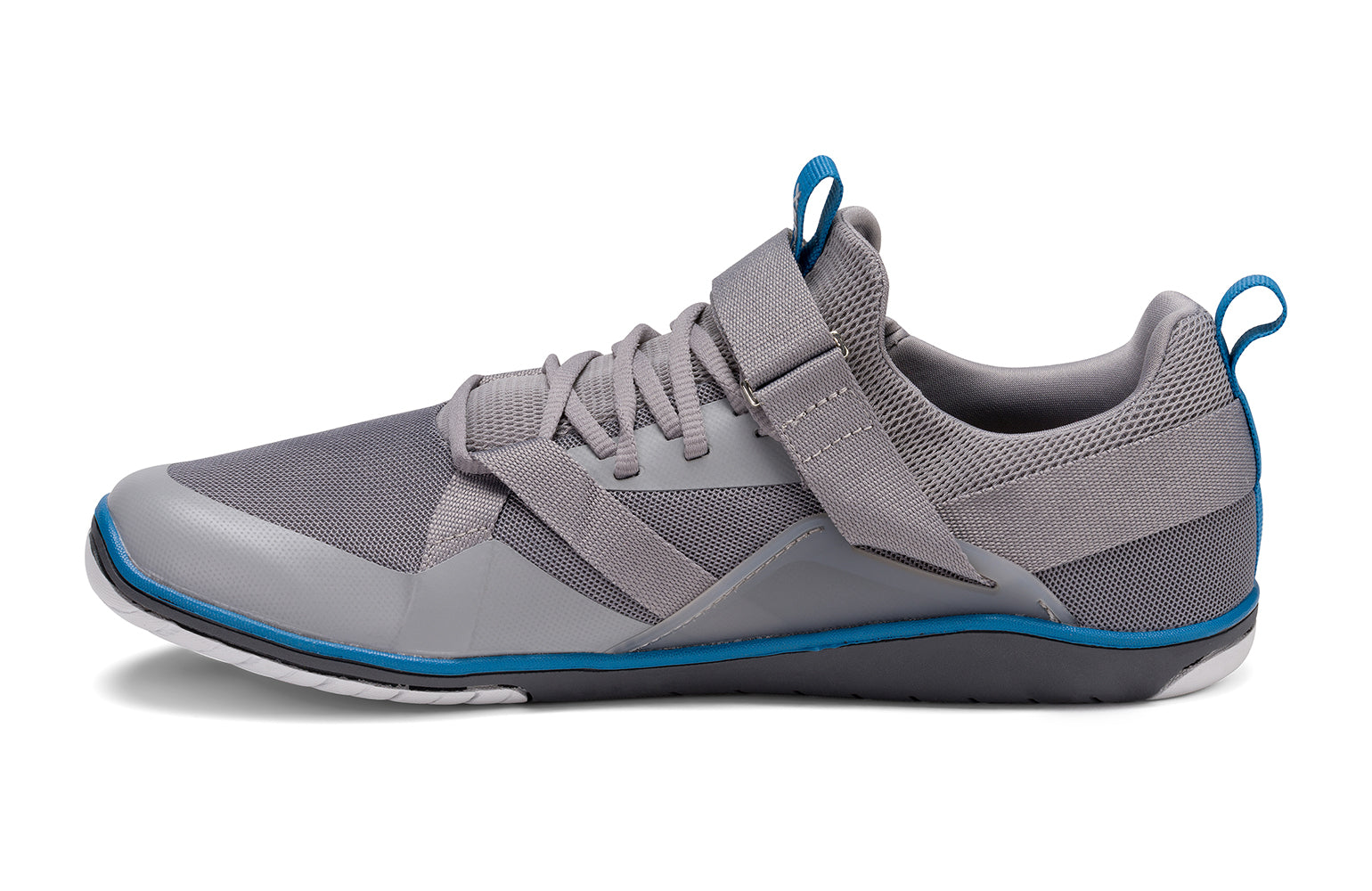 Xero Shoes Canada, specifically barefoot running shoes Canada. These minimalist shoes have flexible soles, wide toe boxes, and zero drop. Side view of Xero Men's Forza Trainer in Frost Gray. A stable training shoe.