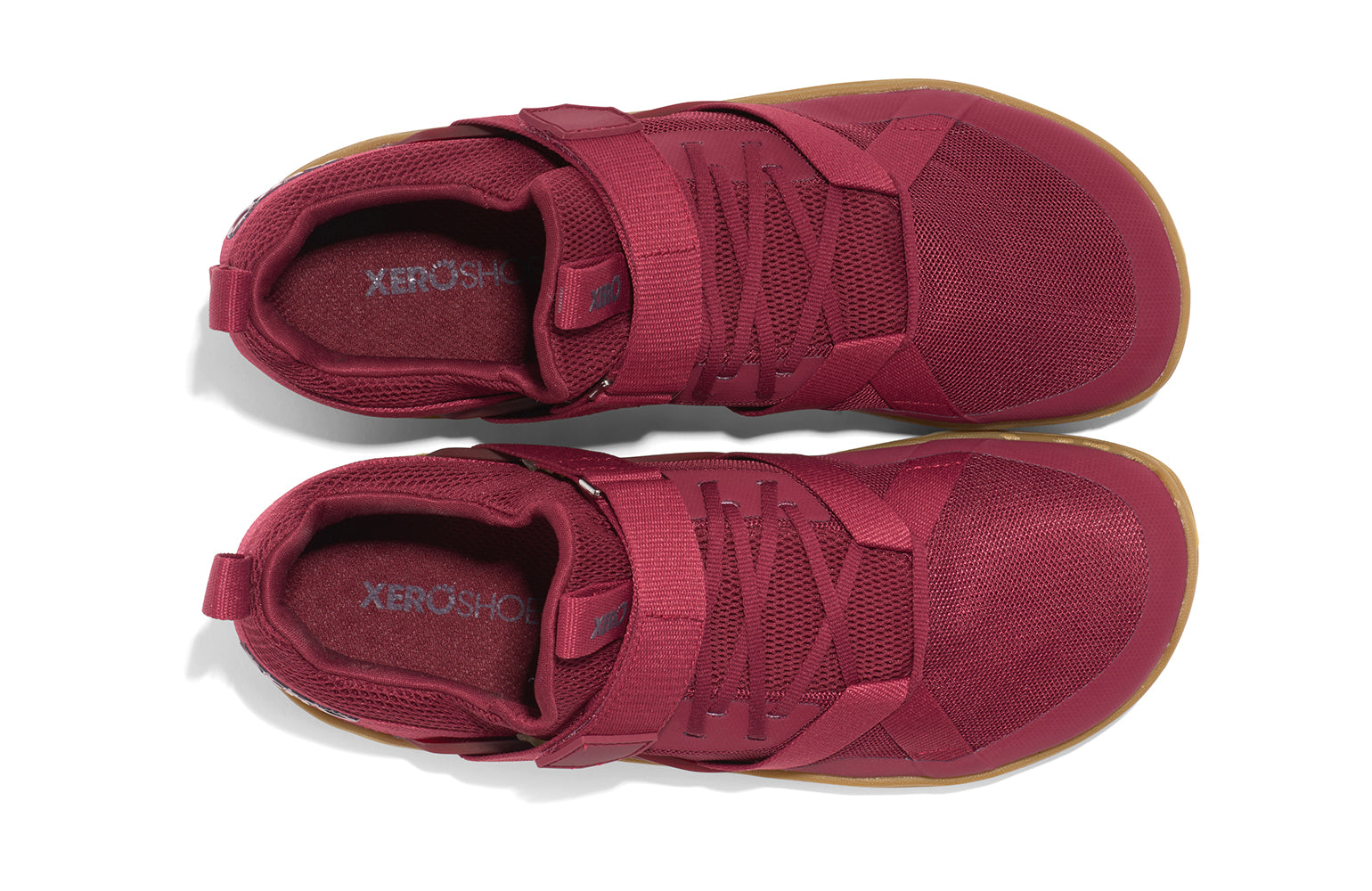 Xero Shoes Canada, specifically barefoot running shoes Canada. These minimalist shoes have flexible soles, wide toe boxes, and zero drop. Top view of Xero Women's Forza Trainer in Tibetan Red/Gum. A stable training shoe.