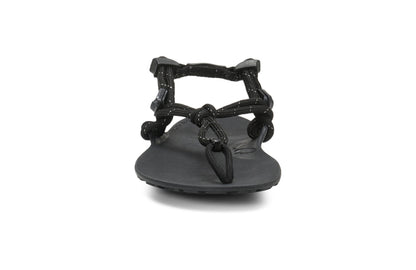 Xero Shoes Canada, specifically women’s barefoot shoes Canada. These minimalist shoes have flexible soles, wide toe boxes, and zero drop. Front view of Xero Women's Genesis in Black. Lightweight, packable, travel-friendly sandal.  