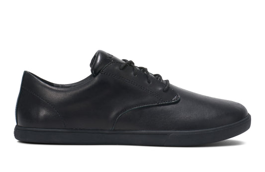 Xero Shoes Canada, specifically men’s barefoot shoes Canada. These minimalist shoes have flexible soles, wide toe boxes, and zero drop. Side view of Xero Men's Glenn  Dress in Black. Dressy leather sneaker. 