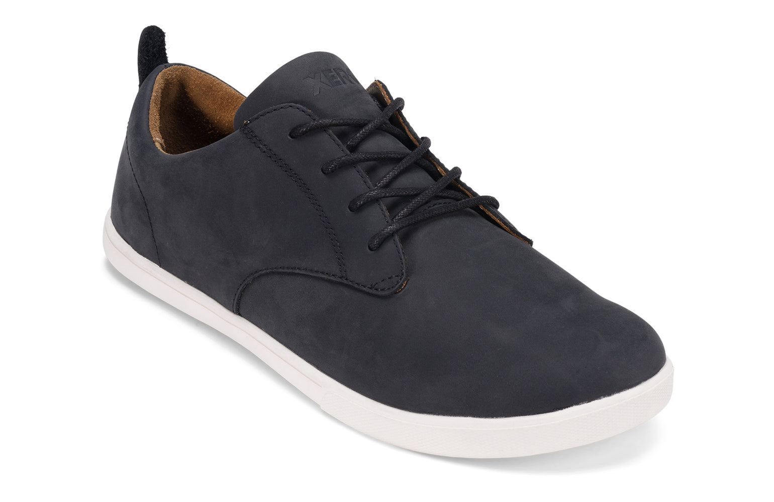 Xero Shoes Canada, specifically men’s barefoot shoes Canada. These minimalist shoes have flexible soles, wide toe boxes, and zero drop. Angled view of Xero Men's Glenn in Black/White. Dress casual leather shoe. 