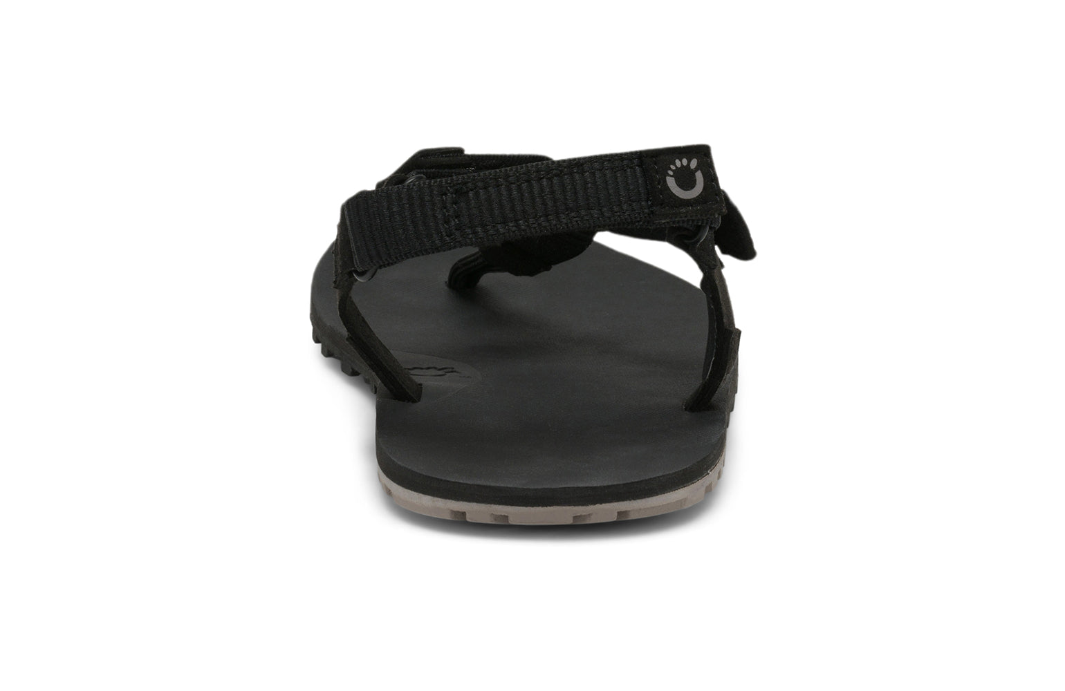 Xero Shoes Canada, specifically men’s barefoot shoes Canada. These minimalist shoes have flexible soles, wide toe boxes, and zero drop. Back view of Men's H-Trail in Black. A huarache-style hiking sandal.