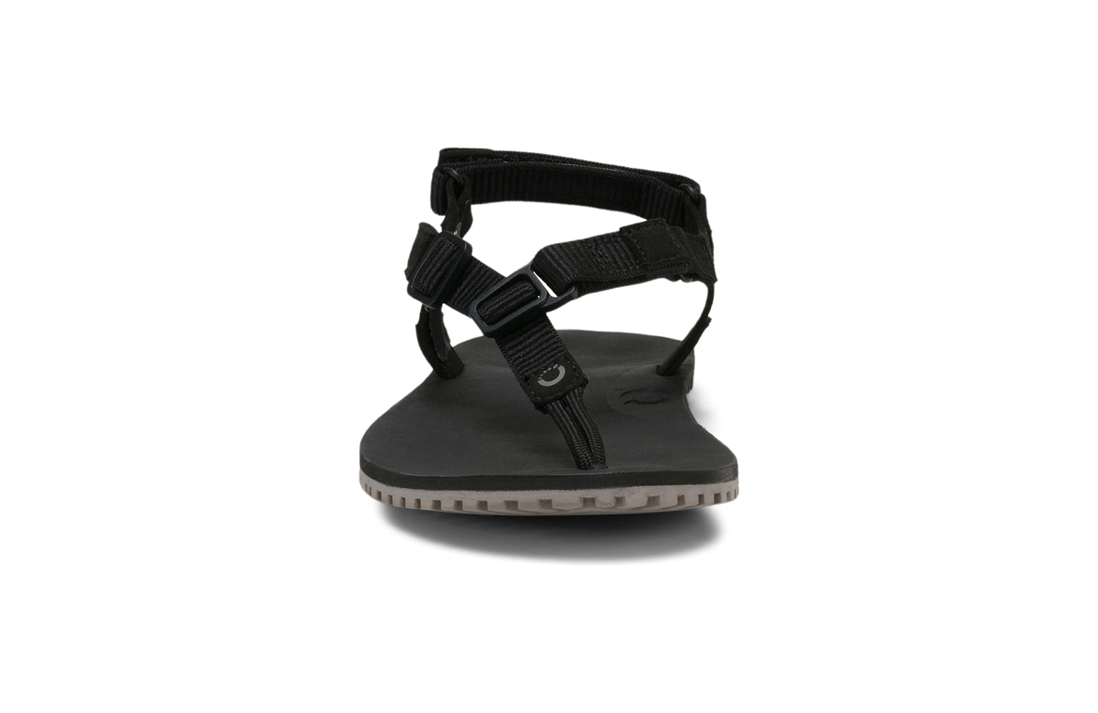 Xero Shoes Canada, specifically men’s barefoot shoes Canada. These minimalist shoes have flexible soles, wide toe boxes, and zero drop. Front view of Men's H-Trail in Black. A huarache-style hiking sandal.