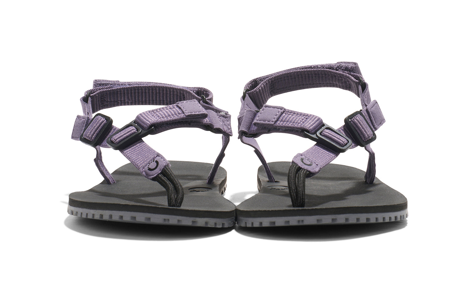 Xero Shoes Canada, specifically women’s barefoot shoes Canada. These minimalist shoes have flexible soles, wide toe boxes, and zero drop. Front view of Women's H-Trail in Sage Purple. A huarache-style hiking sandal.