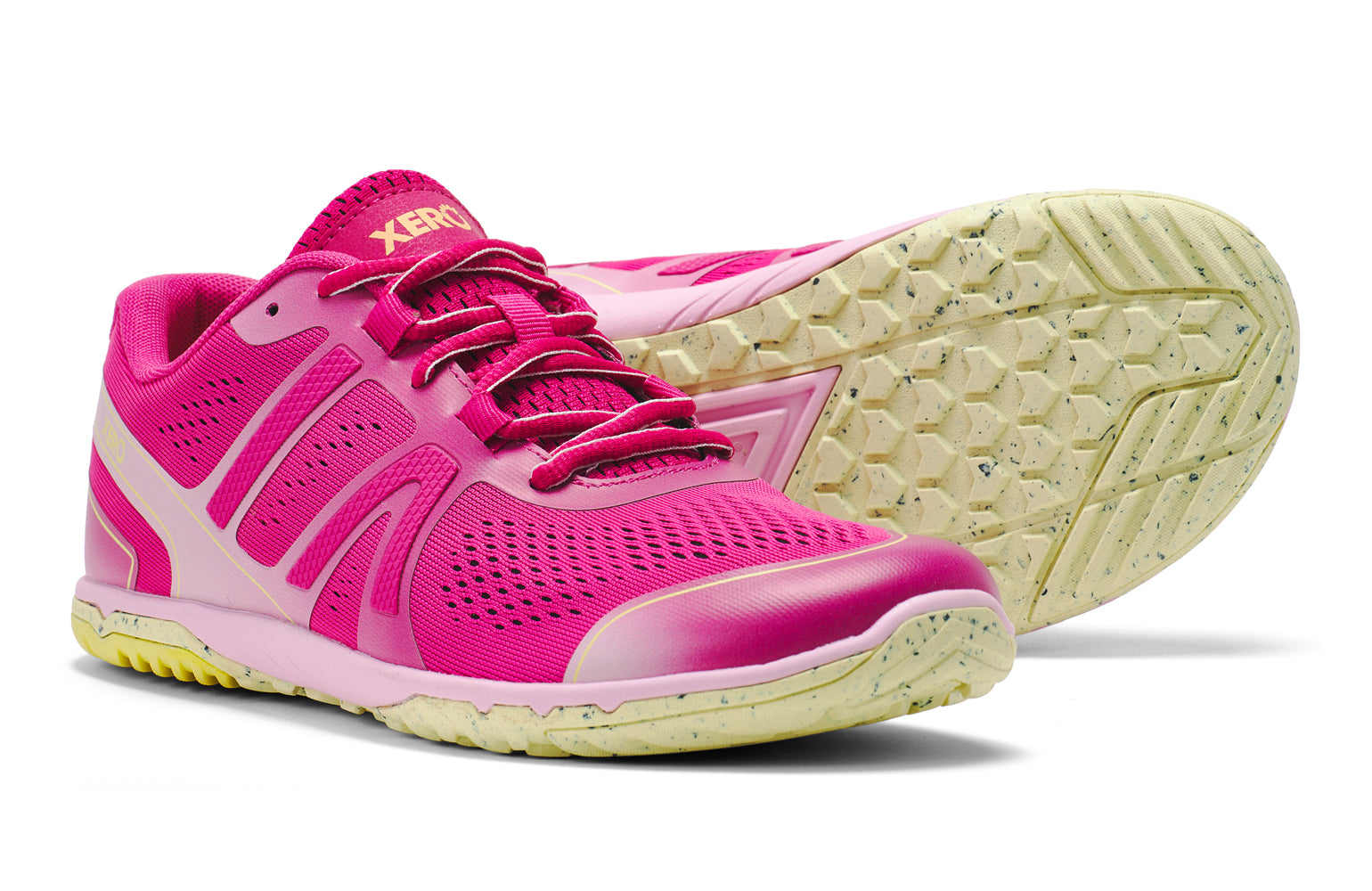 Pink athletic shoe with white sole on a white background.  Tru Stride Co brings Xero Shoes to Canada