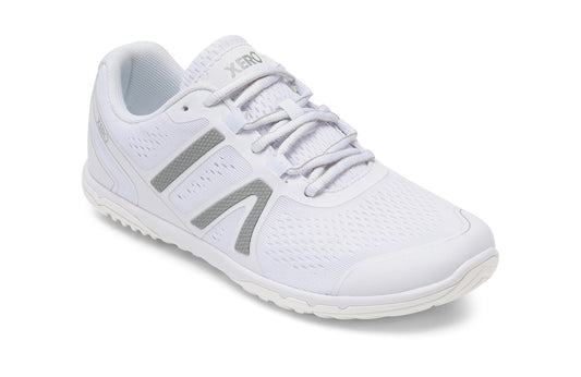 Xero Shoes Canada, specifically barefoot running shoes Canada. These minimalist shoes have flexible soles, wide toe boxes, and zero drop. Angled view of Xero Women's HFS II in White. Lightweight road runner.