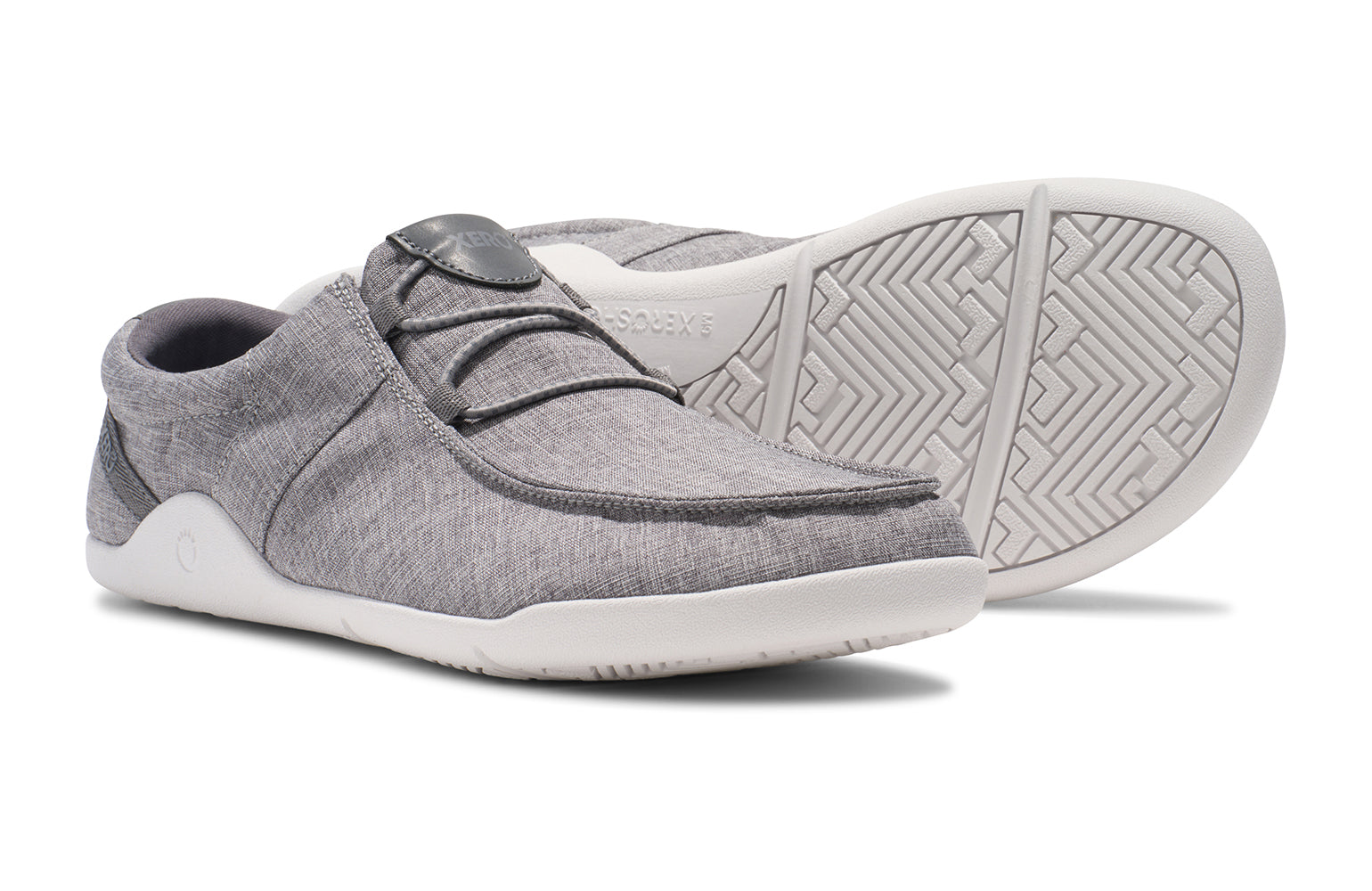 Xero Shoes Canada, specifically men’s barefoot shoes Canada. These minimalist shoes have flexible soles, wide toe boxes, and zero drop. Pair view of Xero Men's Kona in Alloy. Moccasin inspired casual shoe. 