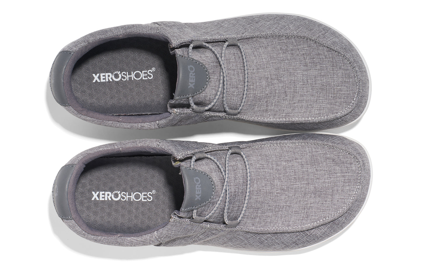 Xero Shoes Canada, specifically men’s barefoot shoes Canada. These minimalist shoes have flexible soles, wide toe boxes, and zero drop. Top view of Xero Men's Kona in Alloy. Moccasin inspired casual shoe. 