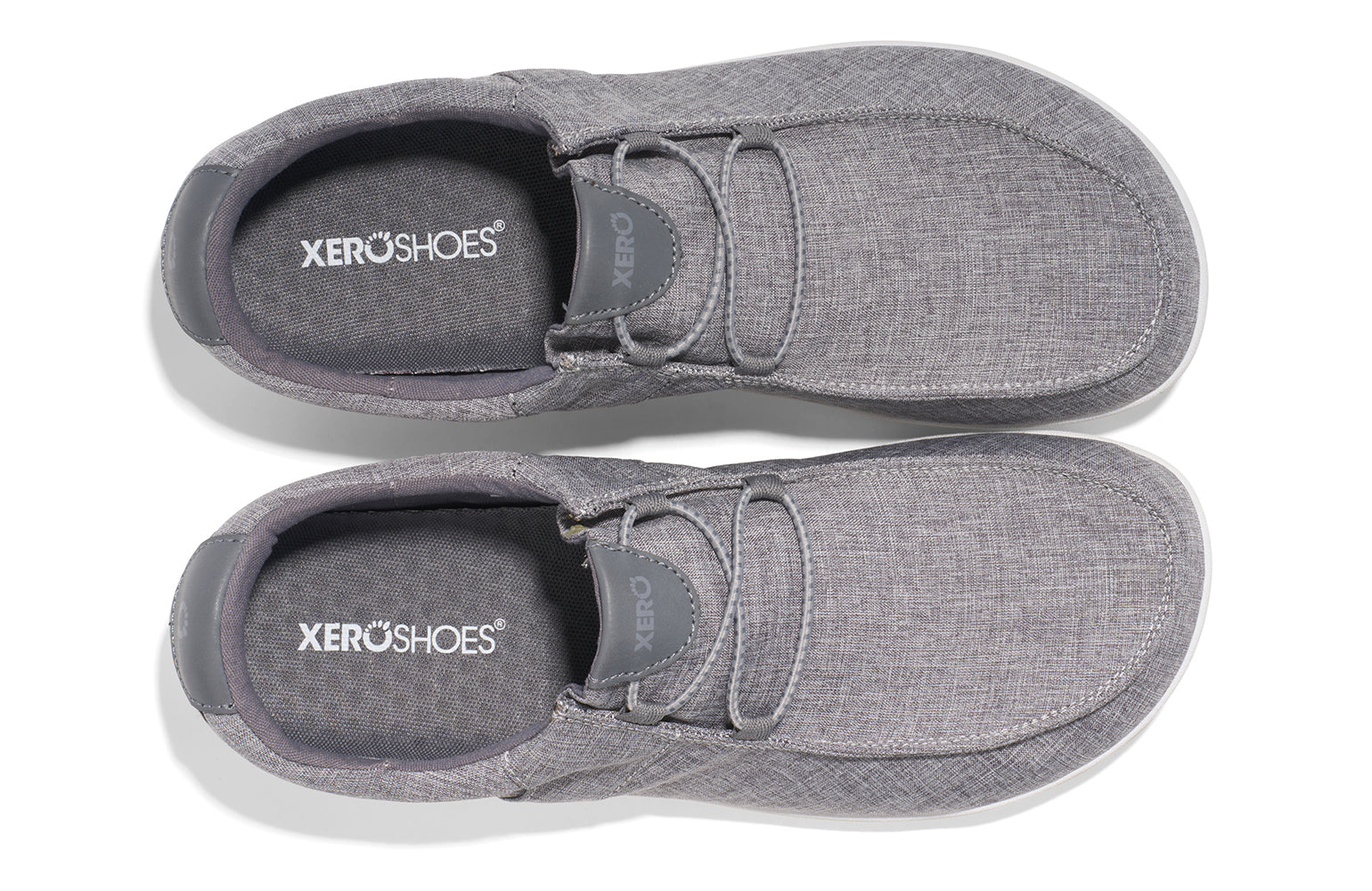 Xero Shoes Canada, specifically men’s barefoot shoes Canada. These minimalist shoes have flexible soles, wide toe boxes, and zero drop. Top view of Xero Men's Kona in Alloy. Moccasin inspired casual shoe. 