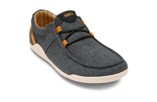 Xero Shoes Canada, specifically women’s barefoot shoes Canada. These minimalist shoes have flexible soles, wide toe boxes, and zero drop. Angled view of Xero Women's Kona in Asphalt. Moccasin inspired casual shoe. 