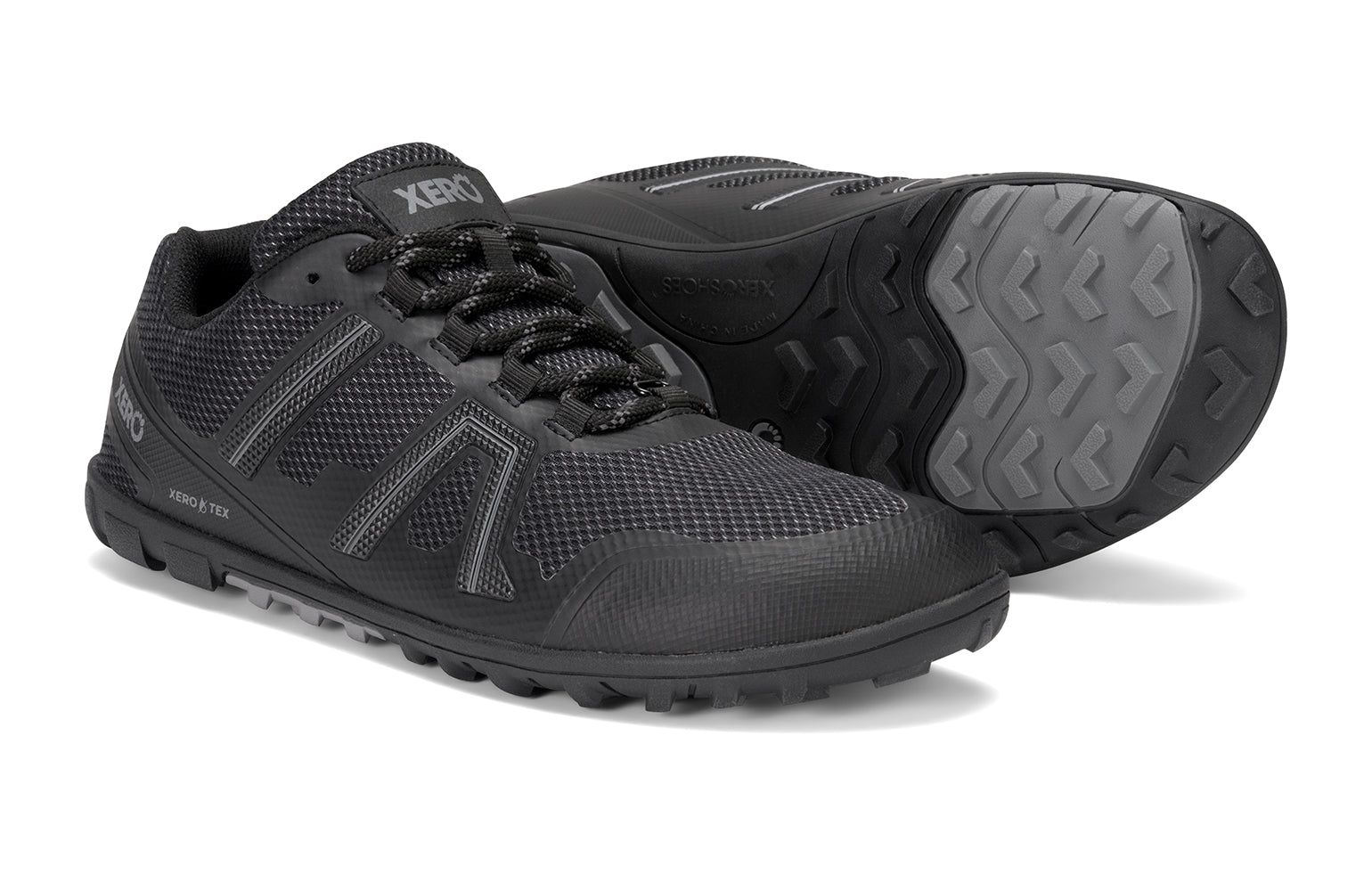 Xero Shoes Canada, specifically barefoot hiking shoes Canada. These minimalist shoes have flexible soles, wide toe boxes, and zero drop. Side and sole pair view of Xero Men's Mesa Trail II in Black. Durable, waterproof hiking shoe. 