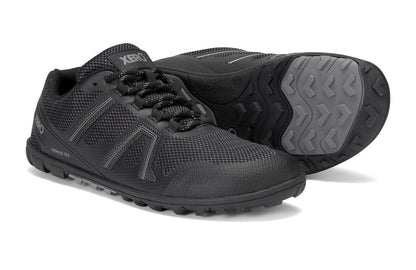 Xero Shoes Canada, specifically barefoot hiking shoes Canada. These minimalist shoes have flexible soles, wide toe boxes, and zero drop. Side and sole pair view of Xero Women's Mesa Trail II in Black. Durable, waterproof hiking shoe. 