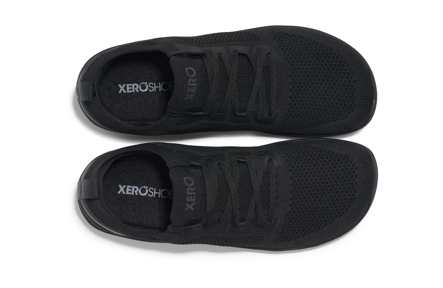 Xero Shoes Canada, specifically barefoot running shoes Canada. These minimalist shoes have flexible soles, wide toe boxes, and zero drop. Top view of Xero Women's Nexus Knit in Black Black. An athletic, comfortable shoe.