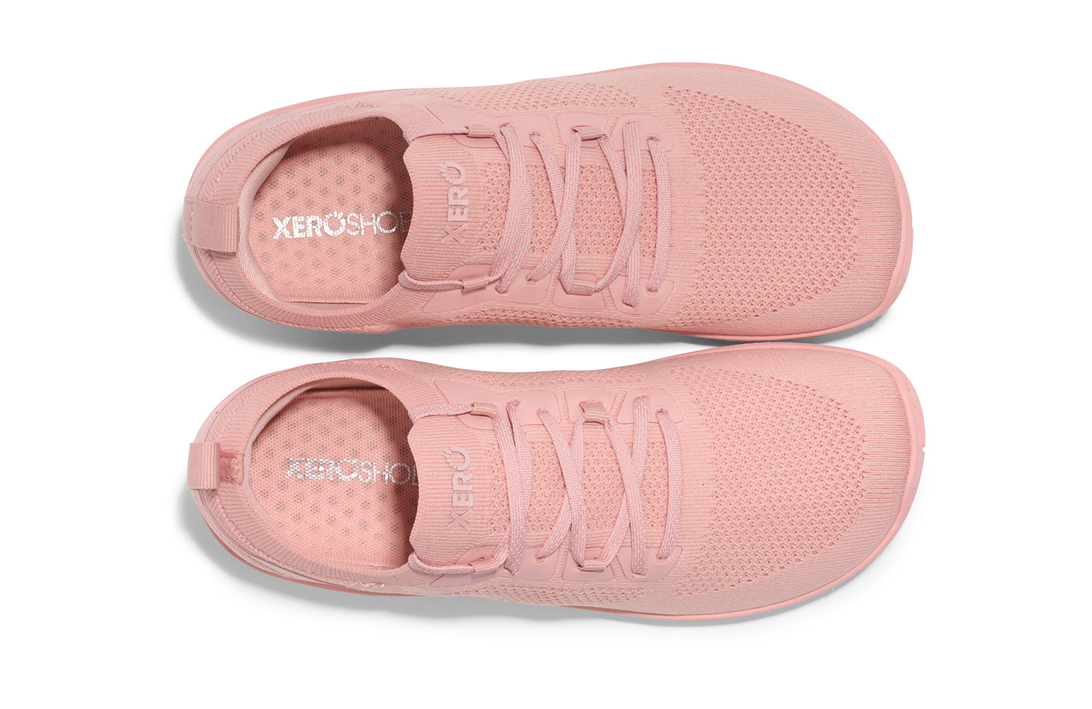 Xero Shoes Canada, specifically barefoot running shoes Canada. These minimalist shoes have flexible soles, wide toe boxes, and zero drop. Top view of Xero Women's Nexus Knit in Pink Sand. An athletic, comfortable shoe.
