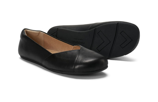 Xero Barefoot Shoes sold in Ontario, Canada. These minimalist shoes have flexible soles, wide toe boxes, and zero drop. Pair view of Xero Women's Phoenix Leather in Black. Women's elegant flat. 
