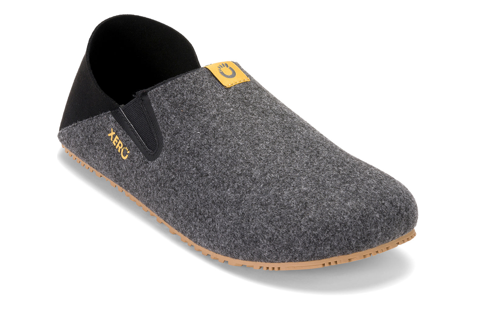 Xero Shoes Canada, specifically men’s barefoot shoes Canada. These minimalist shoes have flexible soles, wide toe boxes, and zero drop. Angled view of Xero Men's Pagosa in Black. Lightweight slipper. 