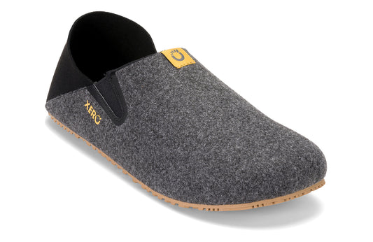 Xero Shoes Canada, specifically men’s barefoot shoes Canada. These minimalist shoes have flexible soles, wide toe boxes, and zero drop. Angled view of Xero Men's Pagosa in Black. Lightweight slipper. 