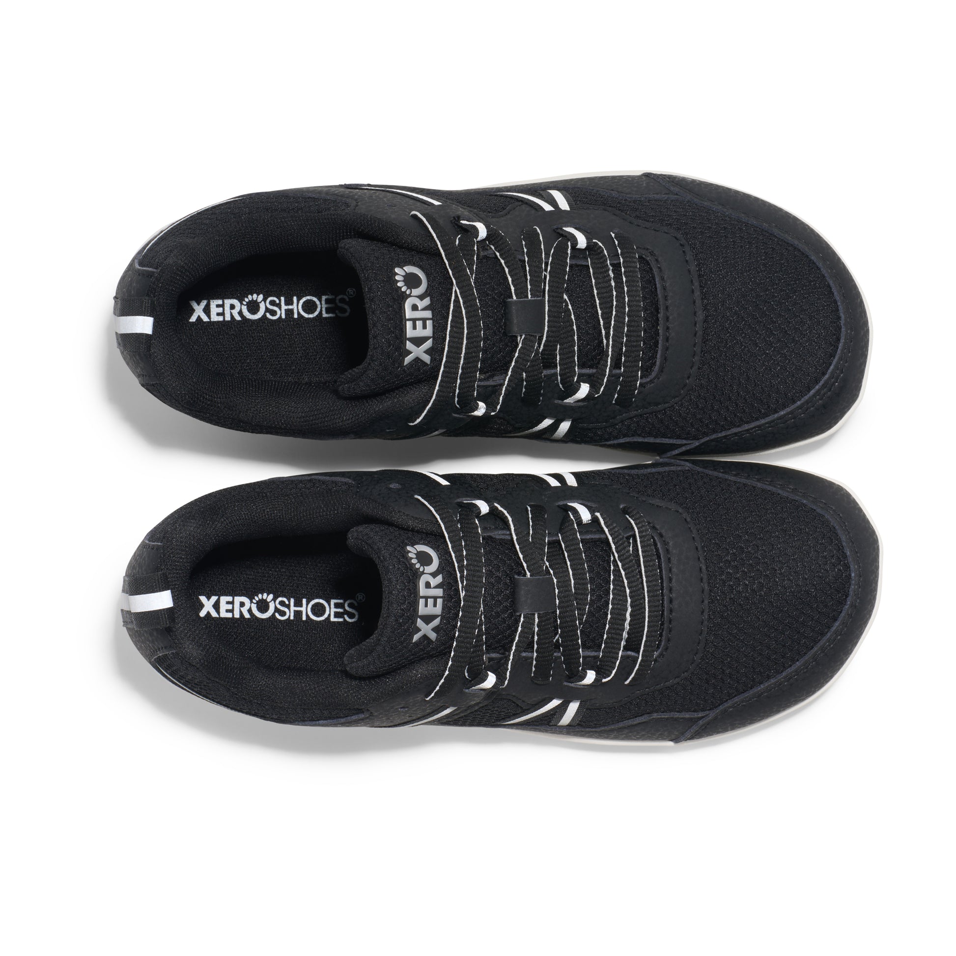 Xero Barefoot Shoes for kids sold in Ontario, Canada. These minimalist shoes have flexible soles, wide toe boxes, and zero drop. Top view of Xero Kid's Prio in Black/White. Casual kid's sneaker.
