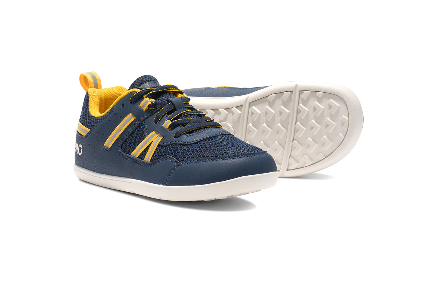 Xero Barefoot Shoes for kids sold in Ontario, Canada. These minimalist shoes have flexible soles, wide toe boxes, and zero drop. Pair view of Xero Kid's Prio in Dress Blues/Yellow. Casual kid's sneaker.