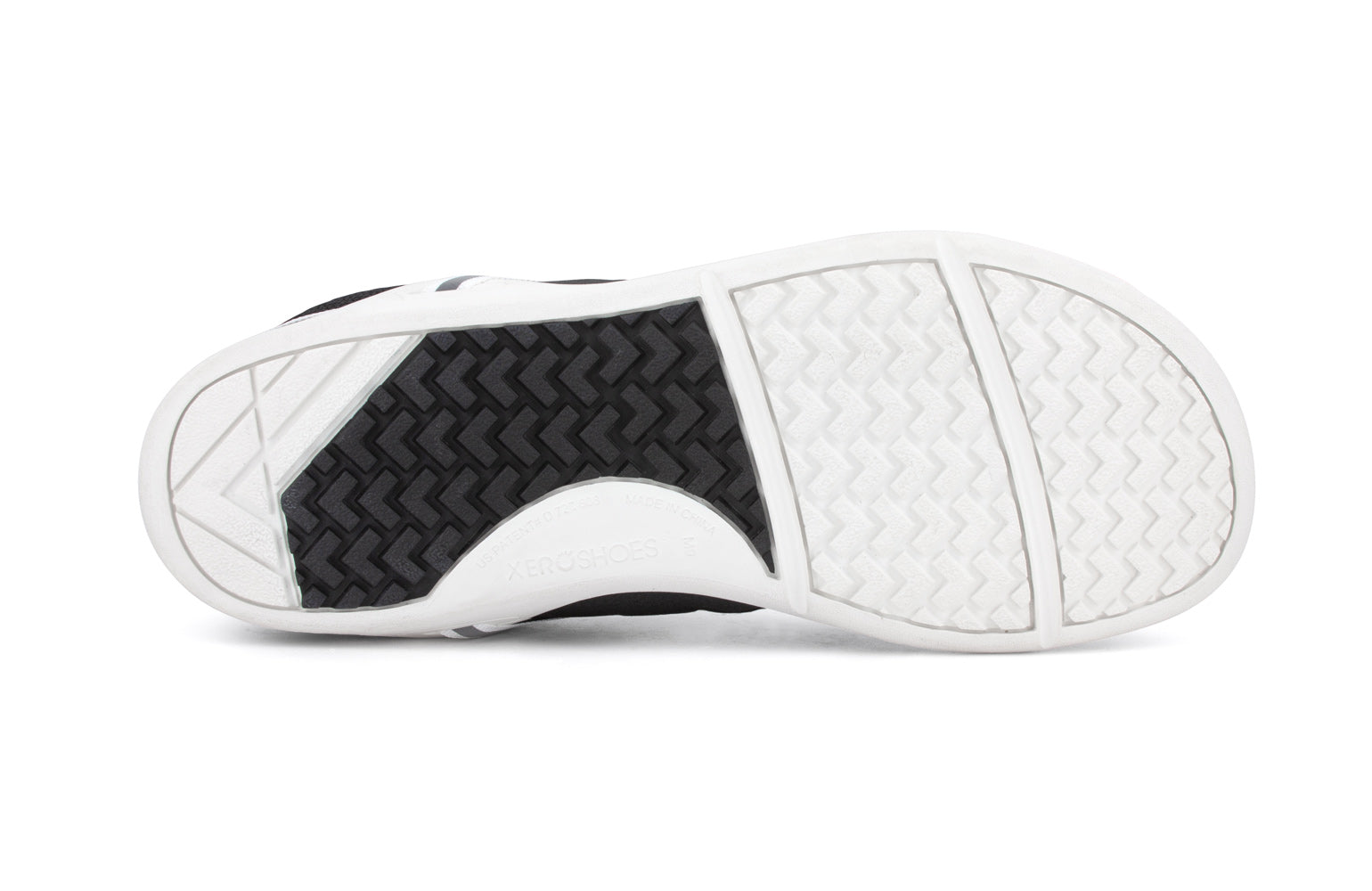 Xero Shoes Canada, specifically men’s barefoot shoes Canada. These minimalist shoes have flexible soles, wide toe boxes, and zero drop. Sole view of Xero Men's Prio in Black White. A running and fitness shoe. 