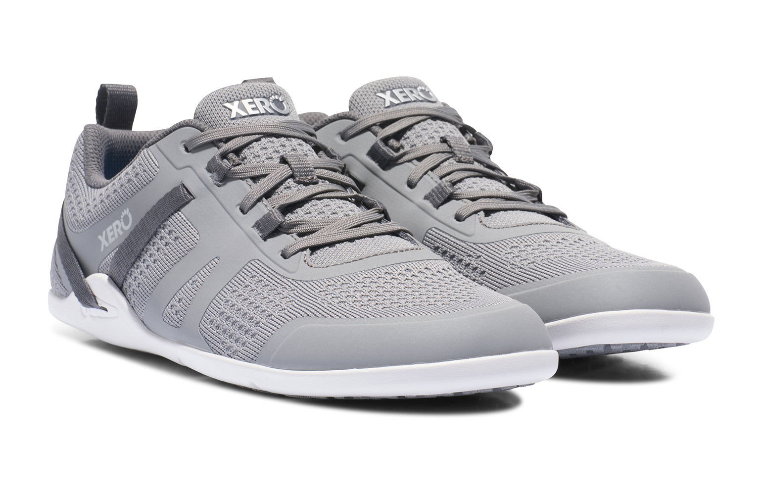 Xero Shoes Canada, specifically barefoot running shoes Canada. These minimalist shoes have flexible soles, wide toe boxes, and zero drop. Angled view of Xero Men's Prio Neo in Alloy. Shoes made for performance and comfort. 