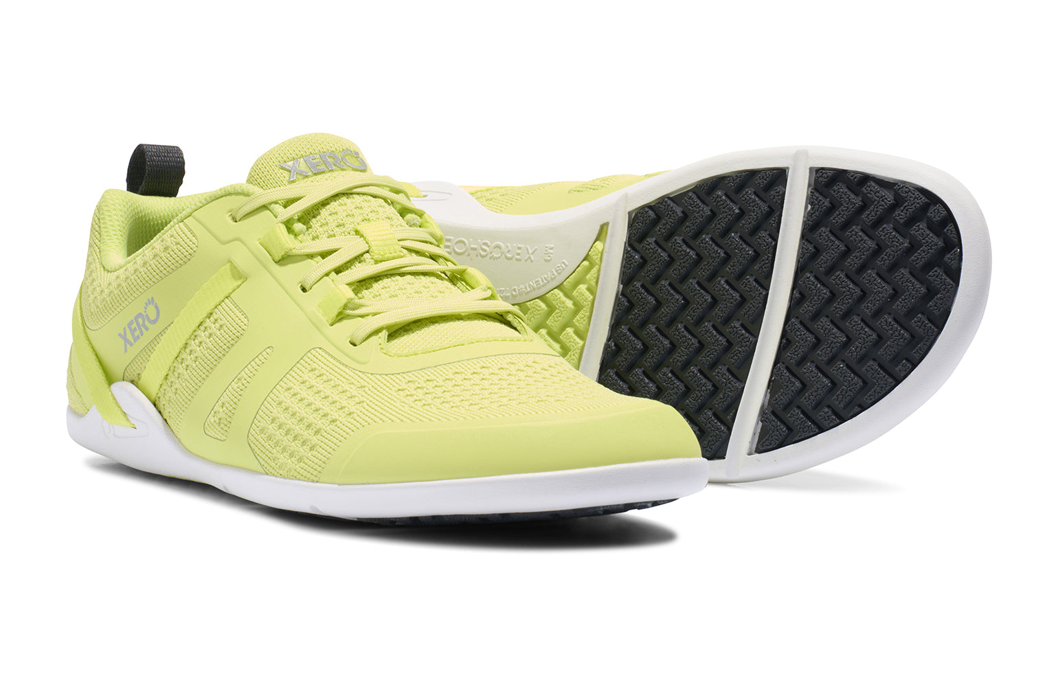 Xero Shoes Canada, specifically barefoot running shoes Canada. These minimalist shoes have flexible soles, wide toe boxes, and zero drop. Angled view of Xero Men's Prio Neo in Sunny Lime. Shoes made for performance and comfort. 