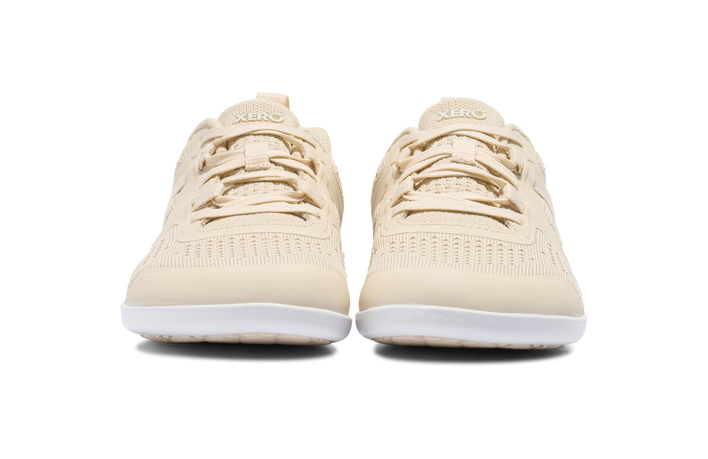 Xero Shoes Canada, specifically barefoot running shoes Canada. These minimalist shoes have flexible soles, wide toe boxes, and zero drop. Front view of Xero Women's Prio Neo in Whitecap Gray. Shoes made for performance and comfort. 