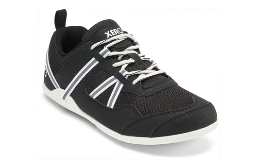Xero Shoes Canada, specifically men’s barefoot shoes Canada. These minimalist shoes have flexible soles, wide toe boxes, and zero drop. Angled view of Xero Men's Prio in Black White. A running and fitness shoe. 